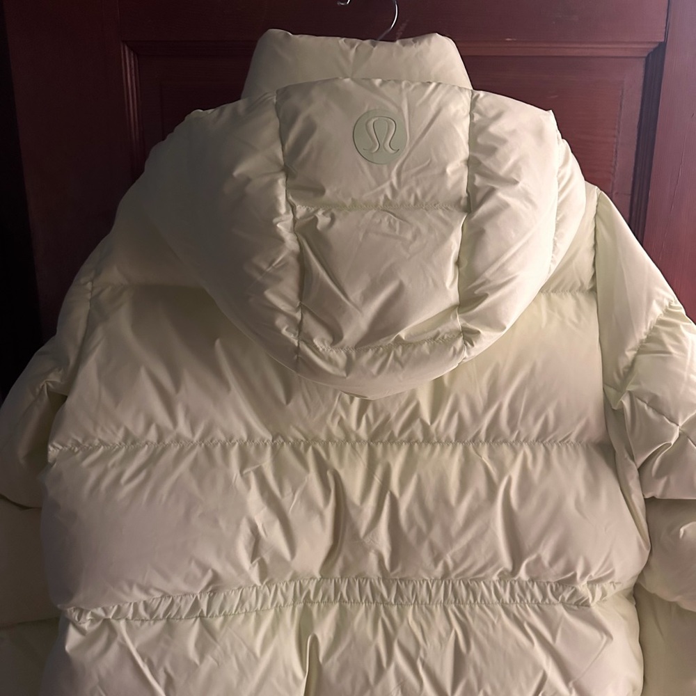 Lululemon athletica Light Yellow Puffer Jacket. Never worn. Too large for me.